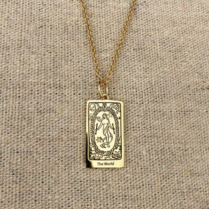 The World Tarot Charm on a necklace