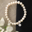 Pulsera elástica perla
